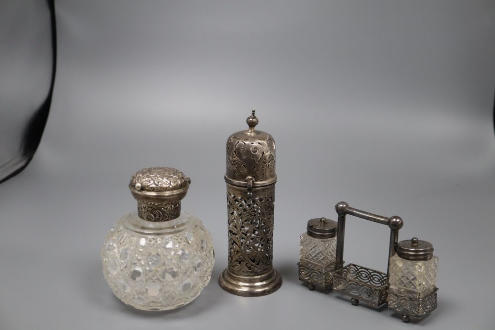 A late Victorian silver topped cut glass scent bottle & 2 other items.